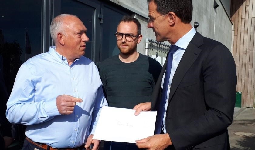 Rutte met pulsvisser Cas Caljouw (1)3.jpeg